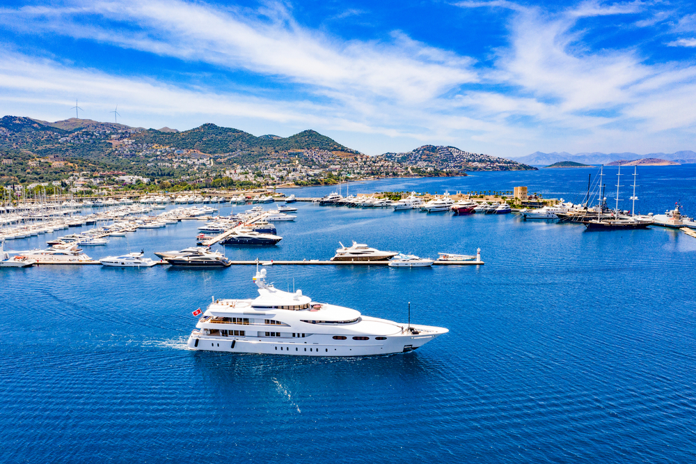 Aerial,Photo,Of,Luxury,Super,Yacht,Marina,And,Sailing,Boats